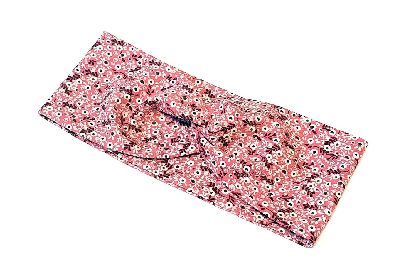 Beispiel eines rosa Stirnbands mit Blumenmuster